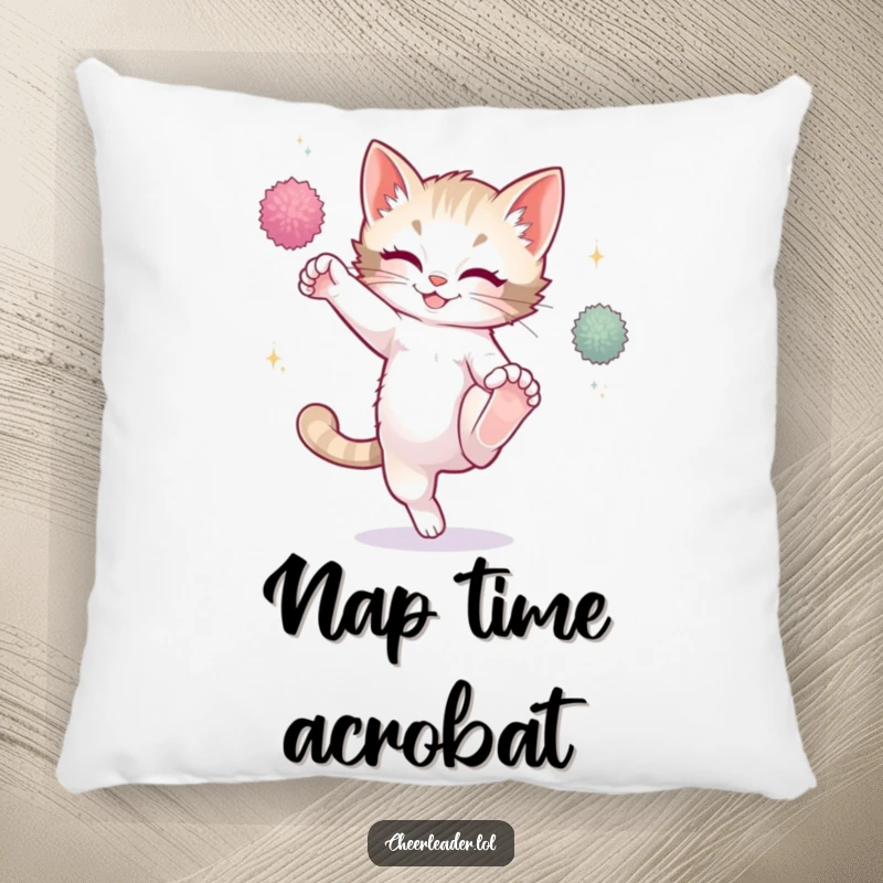 Funny playful kitten performing a high kick, sparkling pom-poms, on a soft pillow, cute cat.
