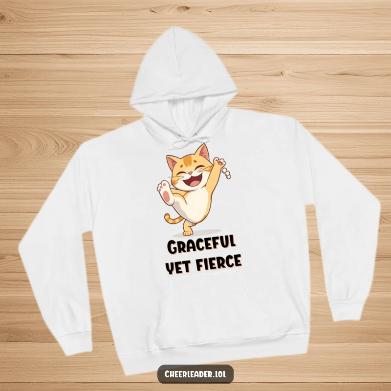 Funny determined cat doing a high kick with a grin, a cozy and humorous martial arts hoodie. Ideal gift.