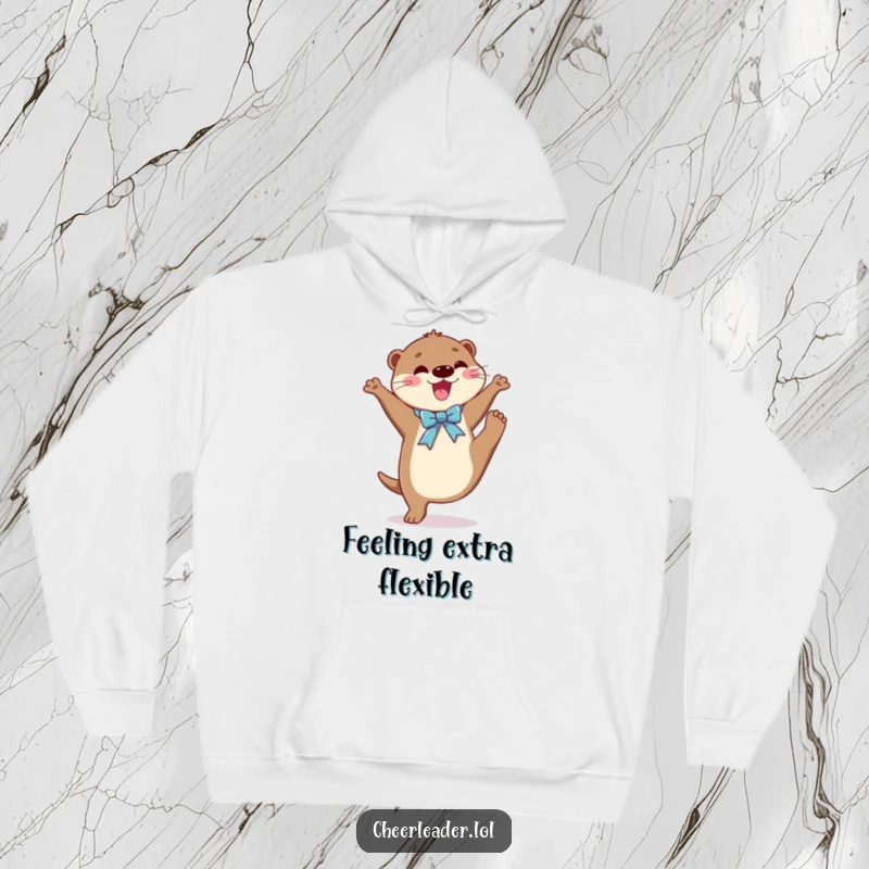 Funny hoodie featuring a joyful otter adorned with a shiny ribbon, performing an impressive high kick with lively enthusiasm.