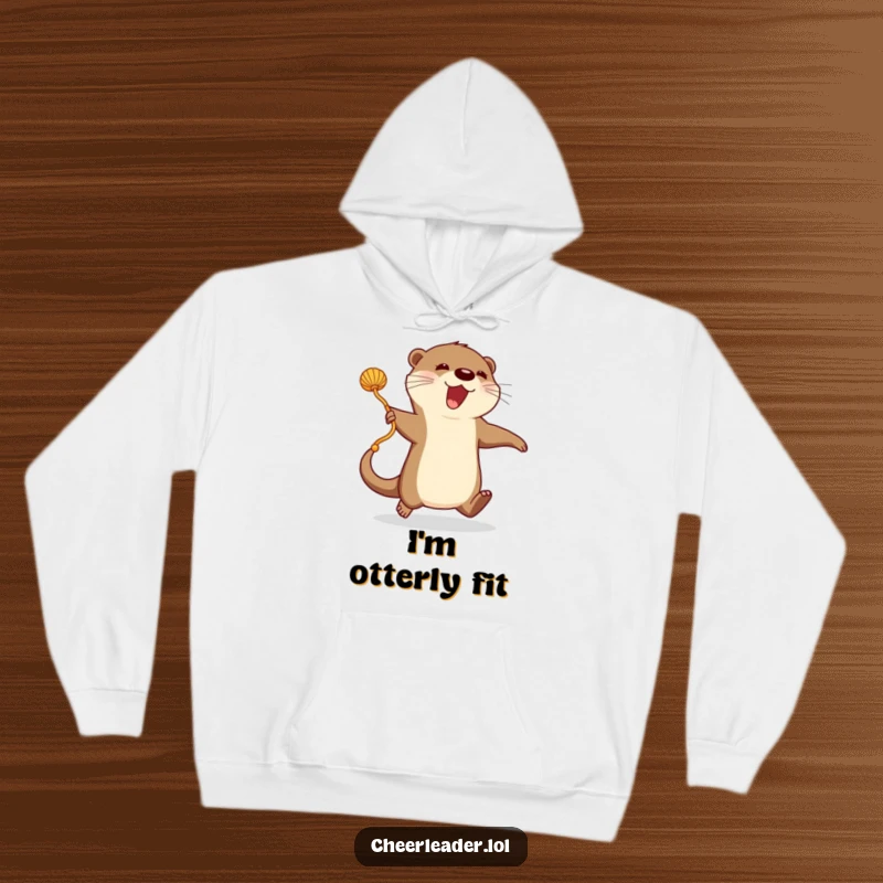 Funny Hoodie: An enthusiastic otter energetically jumps rope with a long pom-pom, showcasing a love for activity.