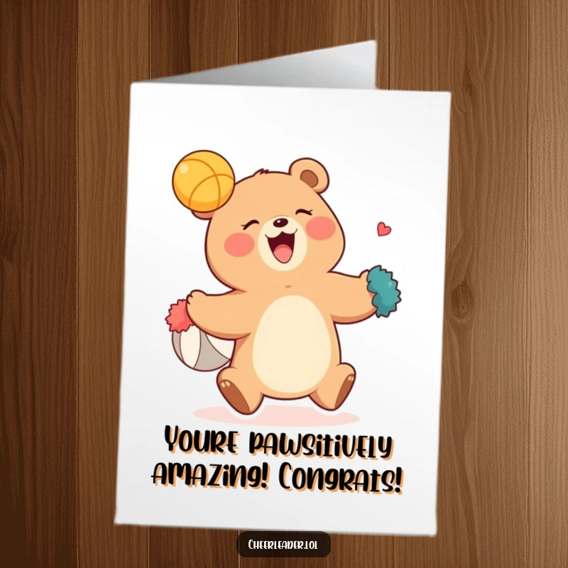 Funny Free Printable Congratulations Card: Giggling bear with pom-poms catches a ball, celebrating success with delight.