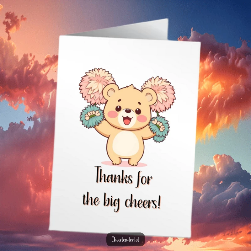 Funny free printable thank you card of a happy bear cub waving large, fluffy pom-poms to show thanks.
