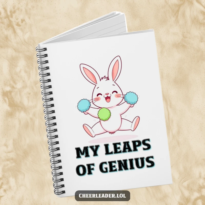 Funny notebook cover showing a gleeful rabbit doing a split with pom-poms, perfect for note-taking and planning.